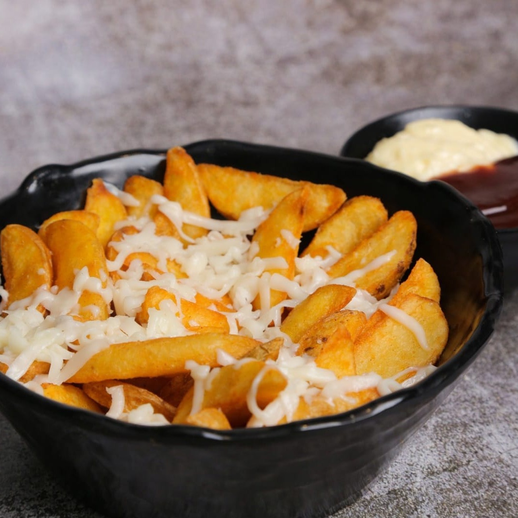 Le Notre Cafe | Cheesy Wedges